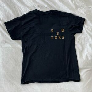 Black and gold Kanye West “I feel like pablo” New York exclusive tee
